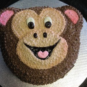 Joli gâteau moulé en forme de figure de singe, pelage très détaillé en crémage au beurre.